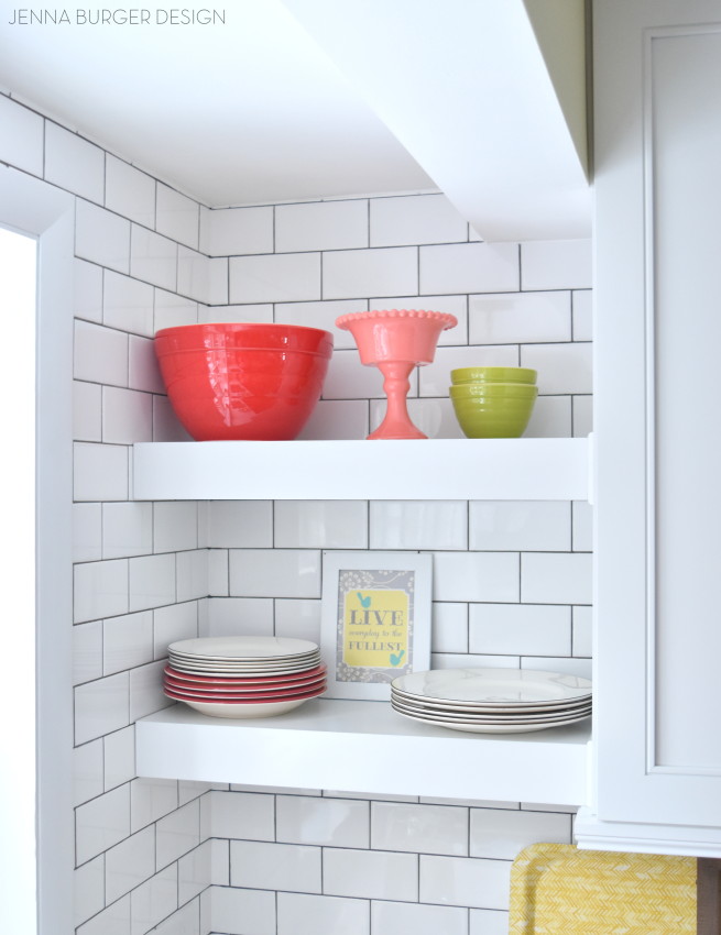 KITCHEN MAKEOVER REVEAL: before and after kitchen renovation with white & gray cabinets, open shelving, subway tile backsplash, quartz countertops, and layers of color. This kitchen is gorgeous! Check out the entire renovation process @ www.JennaBurger.com