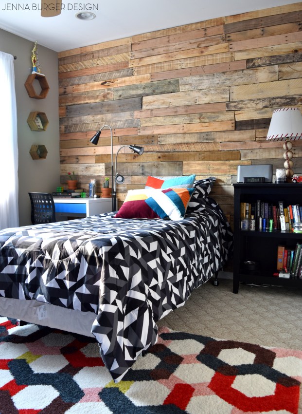 Teen Room Revamp: A pallet wall was added to the focal / bed wall and geometric patterns in bold colors were layered in. Check out more of this space + SOURCES @ www.JennaBurger.com