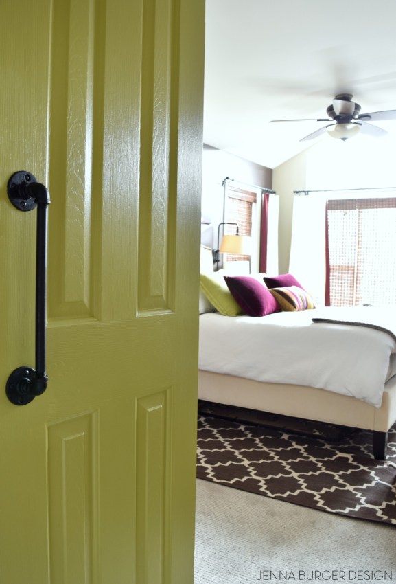 DIY: Rolling door hardware using plumbing pipe. Get the look + function of a rolling door for about $60. Custom size to fit your space. Tutorial by www.JennaBurger.com