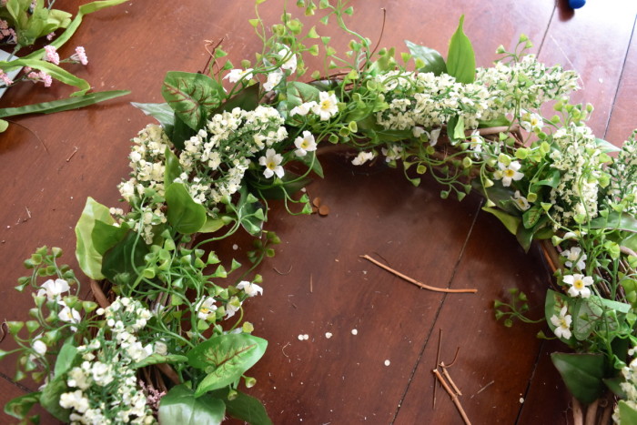 SPRING WREATH: A simple + easy 10-minute creation to adorn the front door. It couldn't be easier to make and a lot less expensive than buying. Easy-to-follow tutorial @ www.JennaBurger.com